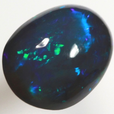 SOLID BLACK OPAL Bright turquoise and blue rolling flashes